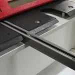 Close up of a support arm on a HSVS Variable Rake Guillotine