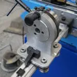 Moving arm with plane of bend indicator Backstop System