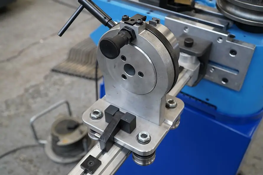 Moving arm with plane of bend indicator Backstop System