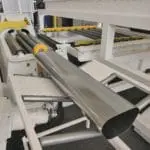 Close up of an elliptical piece of material which has been rolled on an MG CNC Bending Rolls