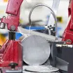 Image of bandsaw blade cutting metal