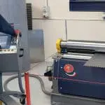 Image of Limpfield working the CNC MG Bending Rolls in their warehouse