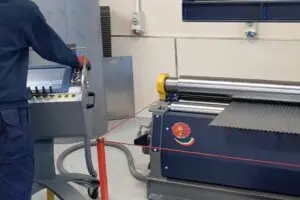 Image of Limpfield working the CNC MG Bending Rolls in their warehouse