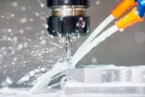 Image of coolant nozzles putting coolant on the cutting area