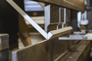 Folding a box fold on a press brake