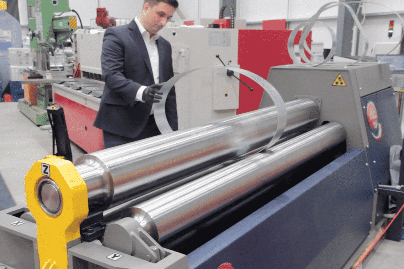 The-advantages-of-using-a-CNC-MG-sheet-and-plate-bending-rolls Bruce Bushnell demonstrating the The advantages of a CNC MG Bending Rolls