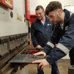 Image of apprentice and Pembrokeshire college lecturer using a Morgan Rushworth Press Brake