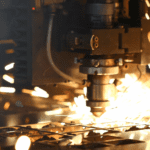 Detail of the plasma cutting head cutting metal