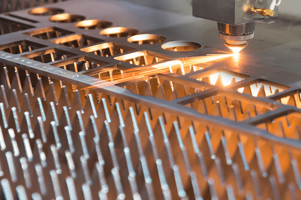Close up of Raytool Cutting Head cutting sheet metal