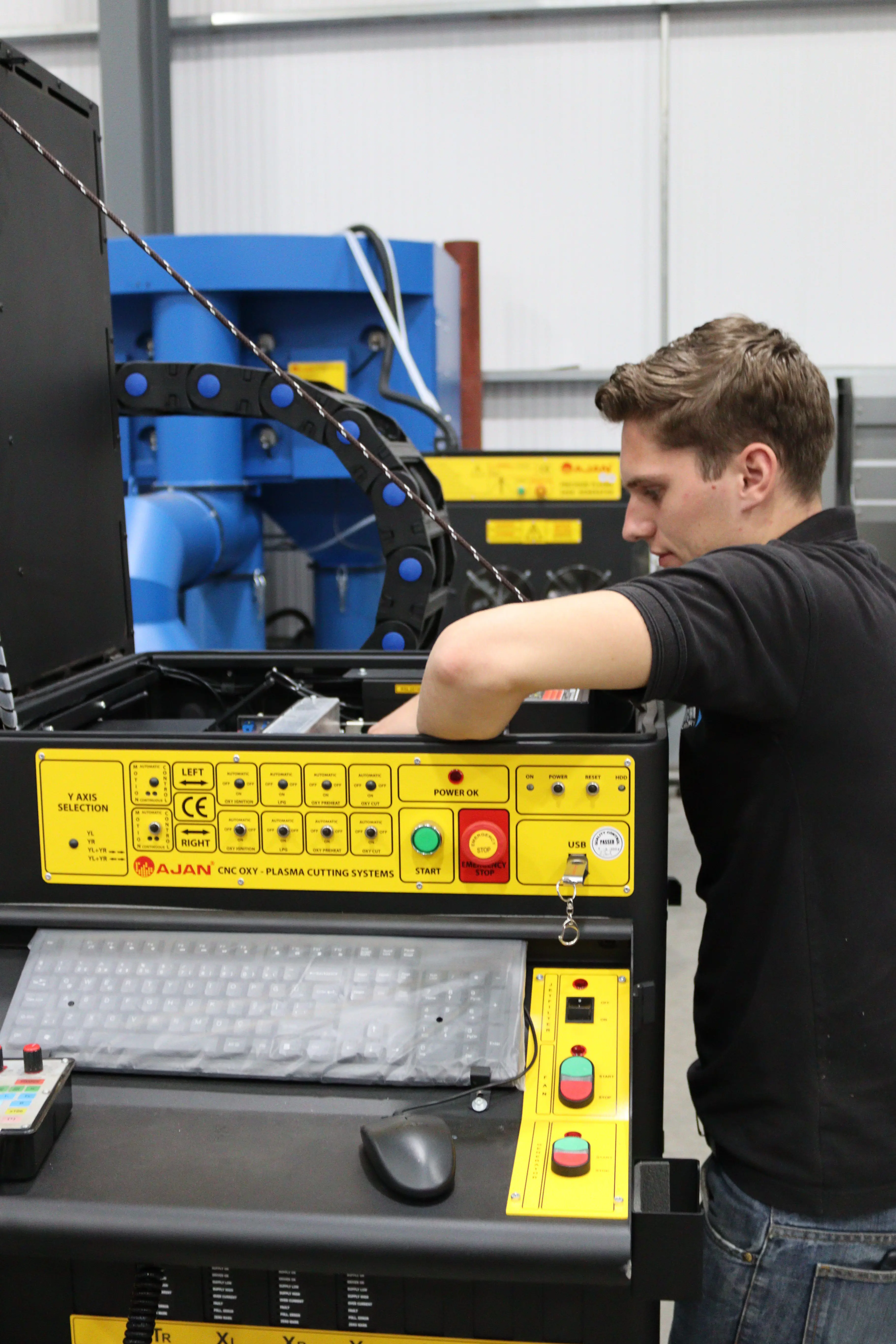 An engineer servicing the machine