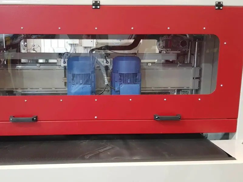 Deburring machine window