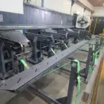 A bundle loading system for a Tube and Section Laser with a bundle of material ready for feeding through.