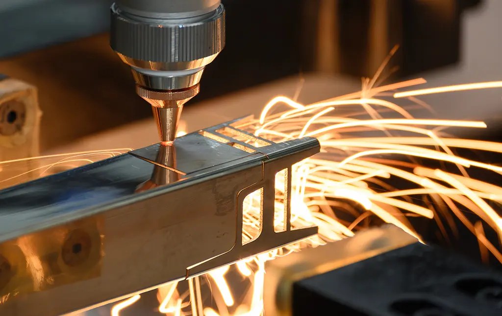 Which Tube Laser Close up of a Tube Laser Cutting out parts of a piece of square box section
