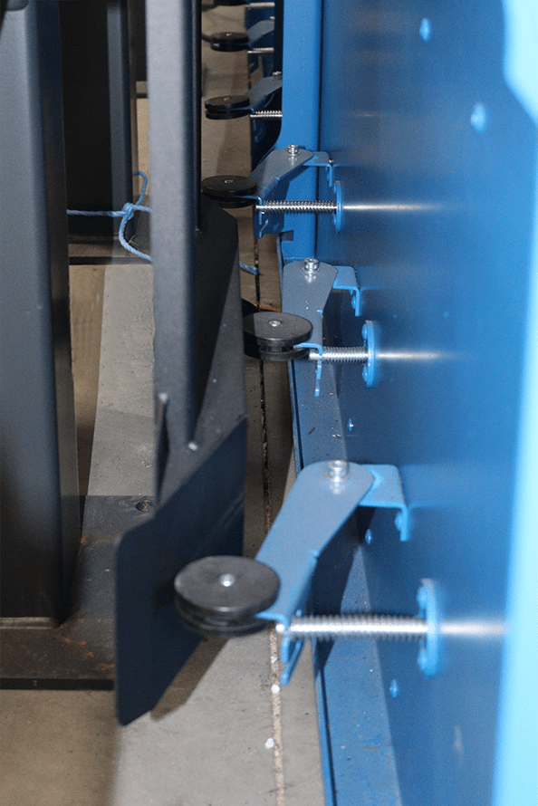The levers that operate the Zoned Extraction System of the Ajan Plasma Cutting Machine