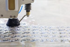 Image of waterjet nozzle cutting