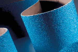 Close up image of blue abrasive belt