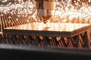 Image of Laser Head cutting a sheet metal plate